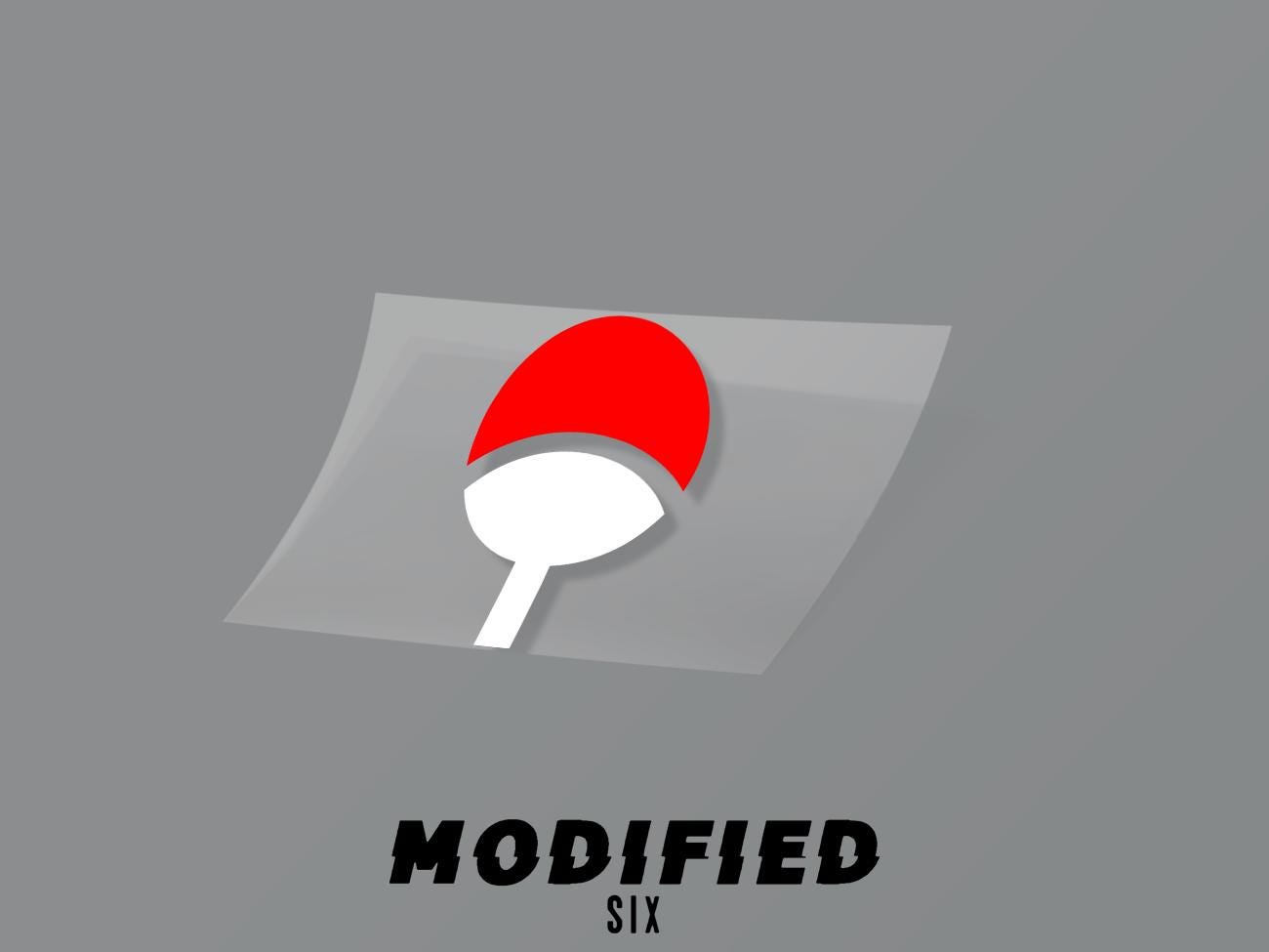 a red and white ping pong ball on a gray background